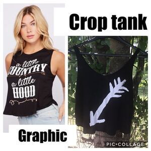Vintage- Black cropped tank w/ white arrow graphic. Women’s Size medium
.